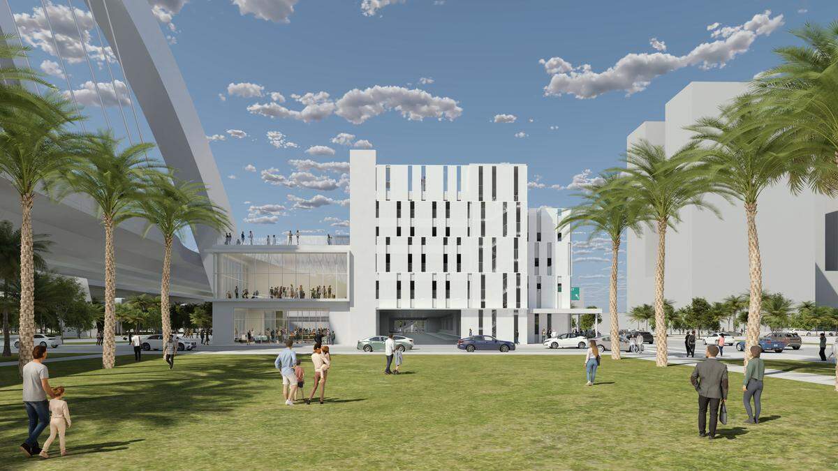 A rendering depicts a possible look for the entrance of a planned parking garage for the Arsht Center for the Performing Arts wedged between the new Interstate 395 westbound span, now under construction, and Northeast Second Avenue. A planned, glassed-in studio space is shown on the left side of the garage building.